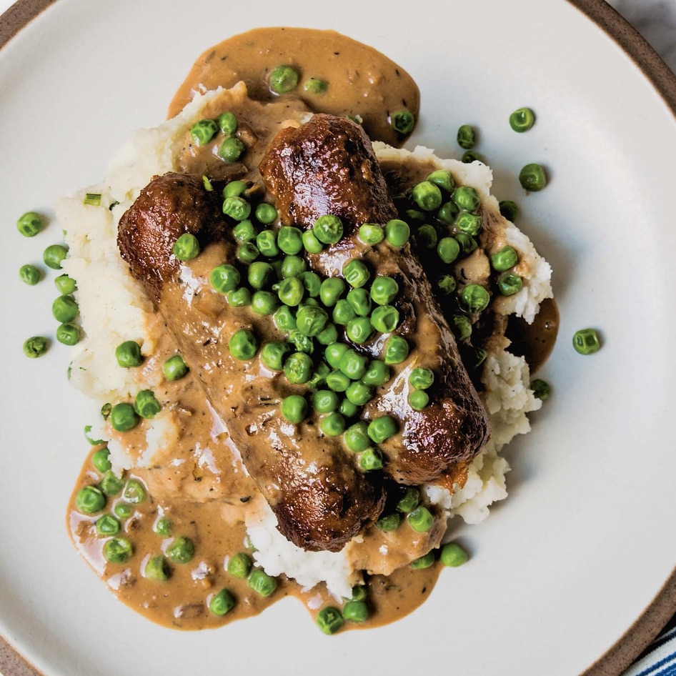 Meaty Vegan Bangers and Mash With Herbed Gravy