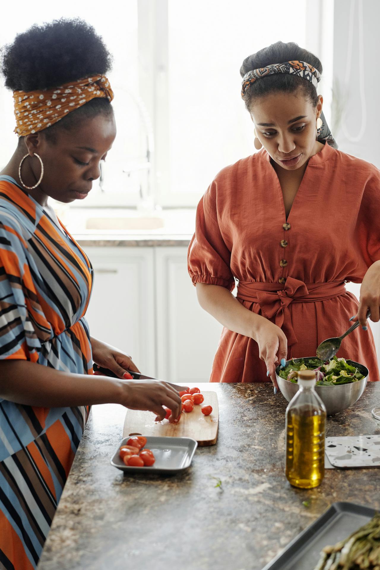 women preparing salad