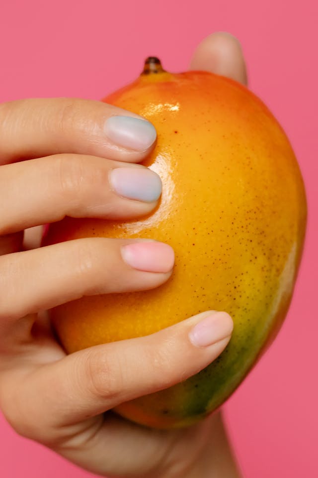 holding mango